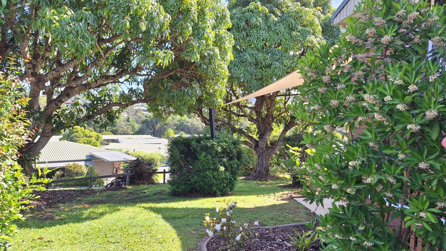 Elevated unit with peaceful garden space for relaxation and community living.