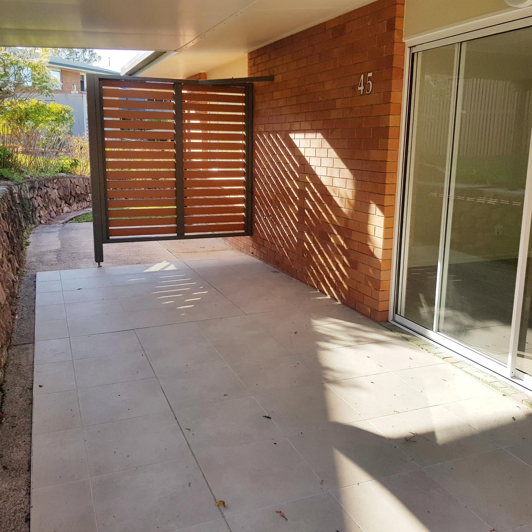 Spacious outdoor patio for easy low maintenance living in retirement unit.