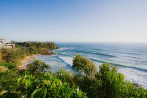 cenic view of Coolum Beach on the Sunshine Coast, Queensland, with sandy shoreline and ocean views.
